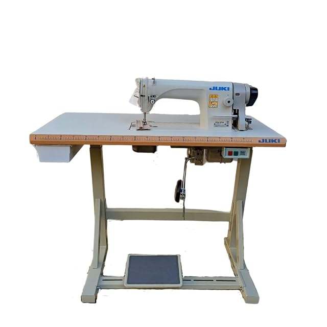Juki DDL-8700 industrial straight-stitch sewing machine on its stand, front three-quarter view